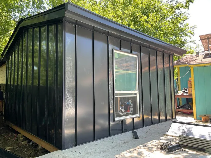 Black standing seam metal wall panels for Roof Inspection in Riverview