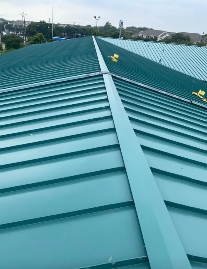 Green commercial metal roof ridge and valley for Metal Roof Repair in Riverview